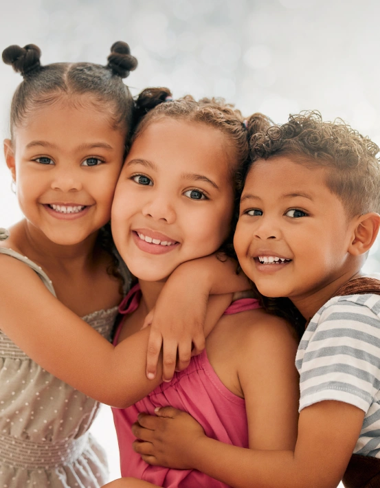 Children smiling during a kid-friendly dental visit